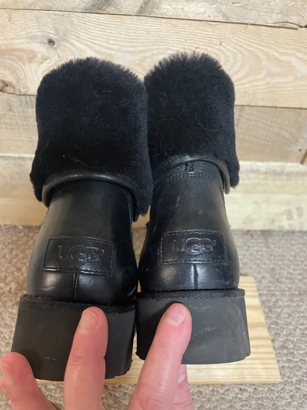 UGG size 7 Black Leather Shearling Zip-Up Ankle Boots